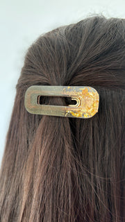 Barrette ovale résine – Coloris Minuit Doré